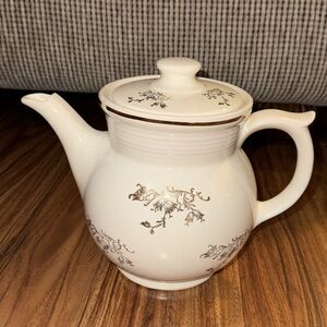 Large white and gold tea pot